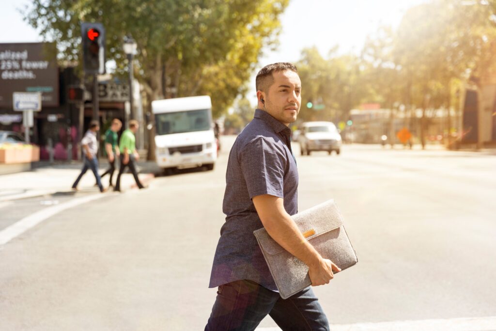 Permanent Residency Holder Man Crossing the Road in Australia
